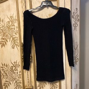 Body hugging very sexy dress. NEVER worn, definitely a head turner!